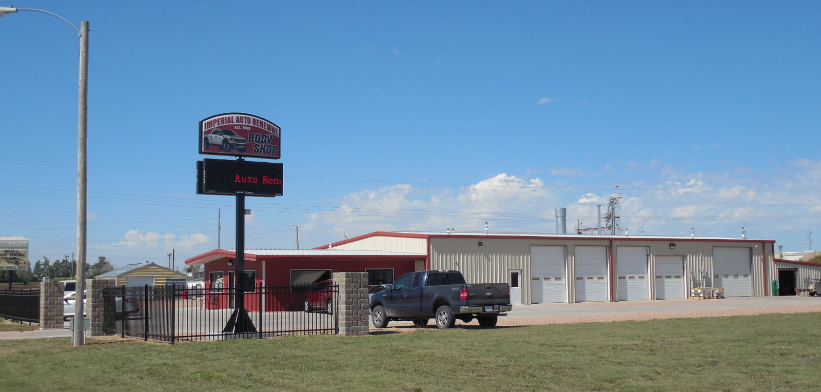 Imperial Auto Renewal body shop building on Champion Hwy in Imperial, Nebraska